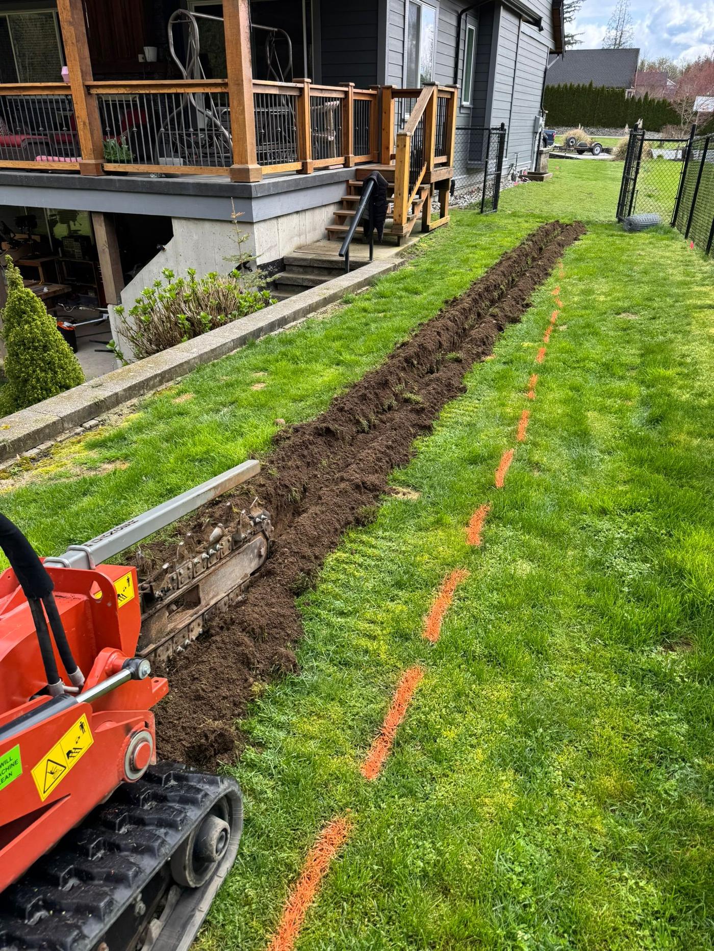 Trenching for underground irrigation pipe installation